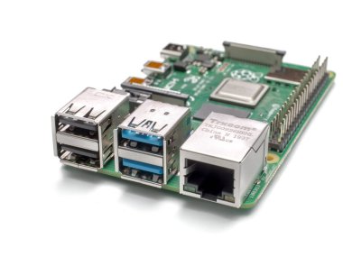 Galati, ROMANIA - March 20, 2020: Close-up of a Raspberry Pi 4 Model-B. The Raspberry Pi is a credit-card-sized single-board computer developed in the UK by the Raspberry Pi Foundation. isolated on white clipart