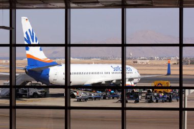 SHARM EL SHEIKH, EGYPT  OCTOBER 2012: SunExpress Airlines Boeing 737 at Sharm El Sheikh International Airport (SSH) on October 16, 2012 in Sharm El Sheikh, Egypt. clipart