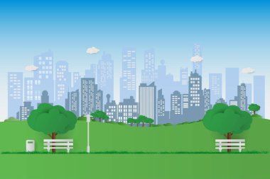 Güzel bir kent park doğada. Şehir park bankında yeşil ağaç ve şehir binaları arka plan ile. egzersiz ve rahatla