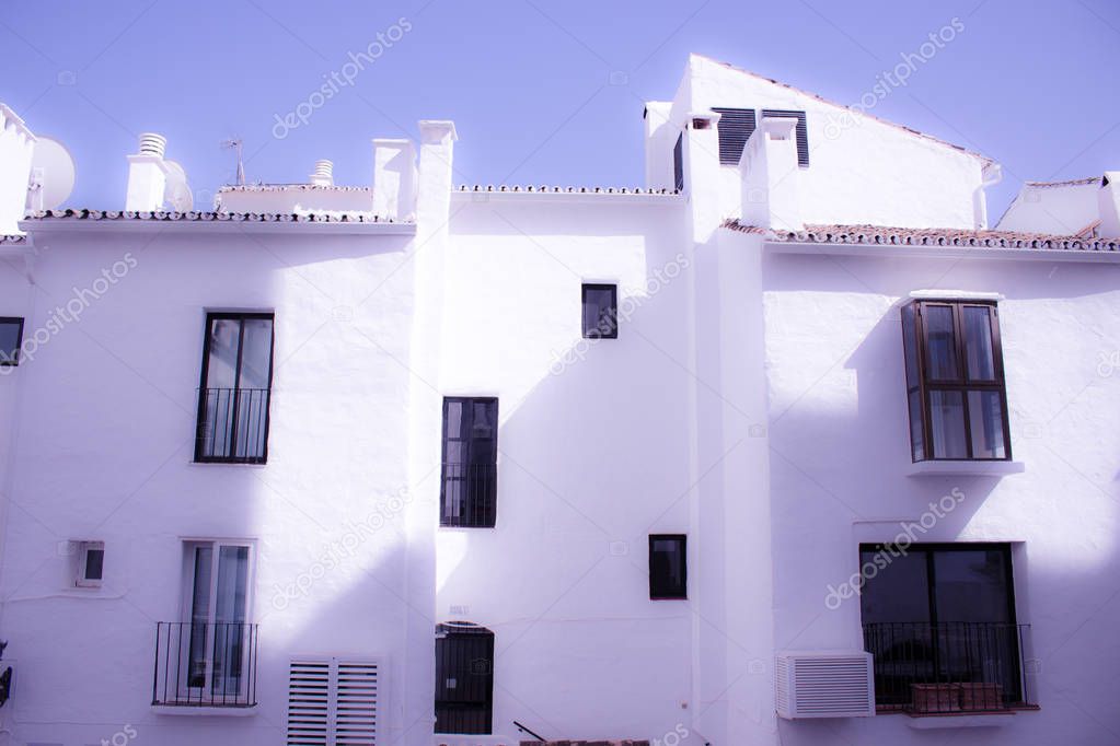 White houses. Traditional buildings. 