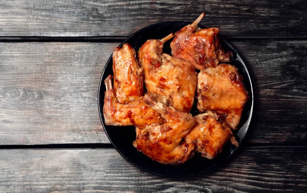 The rabbit baked in an oven in red sauce — Stock Photo, Image