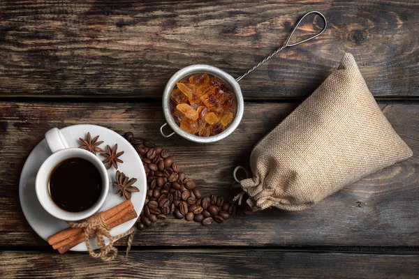 Taste cup of coffee with roasted grains — Stock Photo, Image