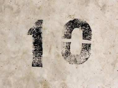 On tane sıfır 10 numara 1 0 beton duvar arka plan üzerinde