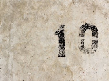 On tane sıfır 10 numara 1 0 beton duvar arka plan üzerinde