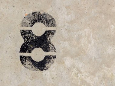 Beton duvar arka plan üzerinde sekiz 8 numaralı