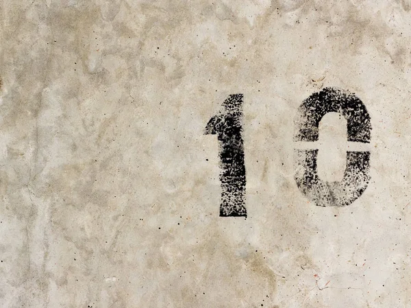 On tane sıfır 10 numara 1 0 beton duvar arka plan üzerinde