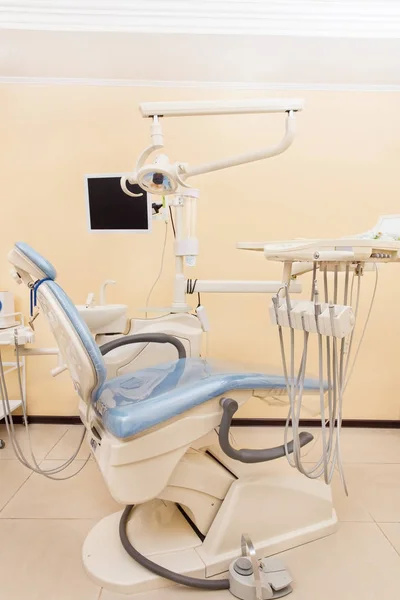 Dental chair with dentistry equipment. Modern dental practice.