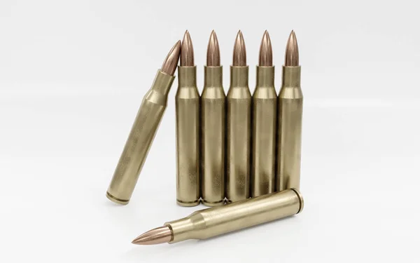 Bullets on white background. A group of rifle bullets isolated on white background. Ammunition on white background. 3d illustration render — Stock Photo, Image