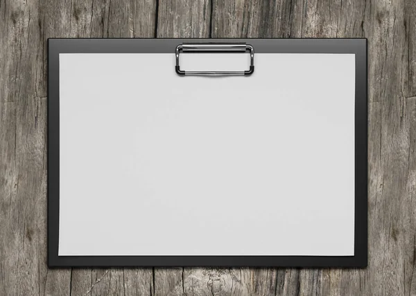 Plastic clipboard with blank paper sheet isolated on wooden background 3d render illustration — 스톡 사진