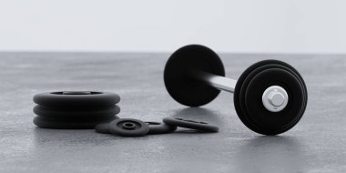 Siyah metal halterler ve ağırlıklar beyaz arka plan fitness eğitim kavramında