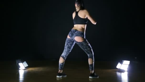 Girl dancing in the studio twerk. — Stock Video