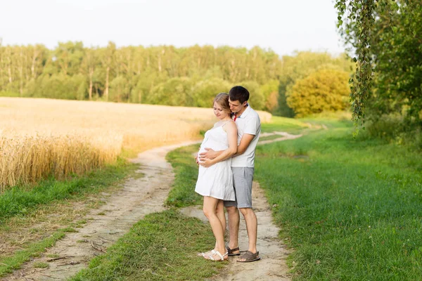 Portrait of beautiful young future parents outdoors — Stock Photo, Image