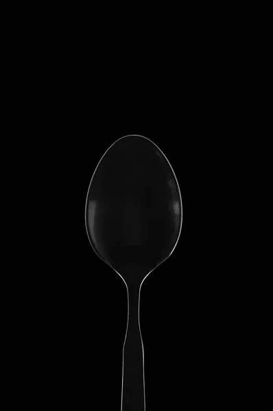 Siyah arka plan üzerine beyaz kontur kaşık