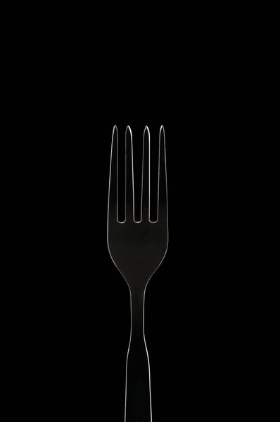 White contour fork on black background