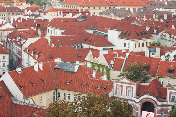 Prague red roofs. City landscape of European town
