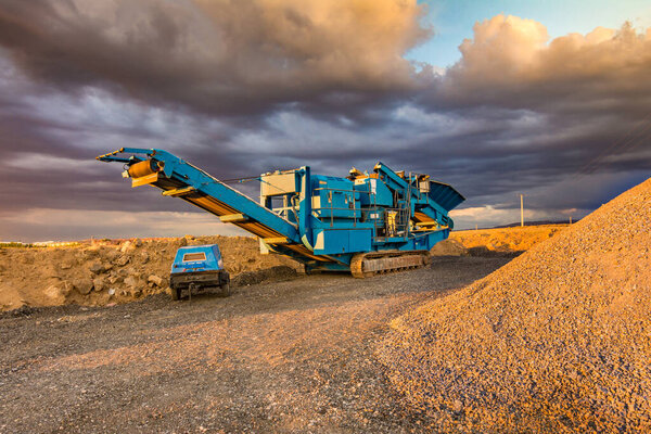 Outdoor industrial activity, mining with heavy machinery