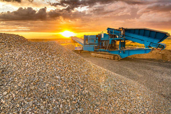 Outdoor industrial activity, mining with heavy machinery