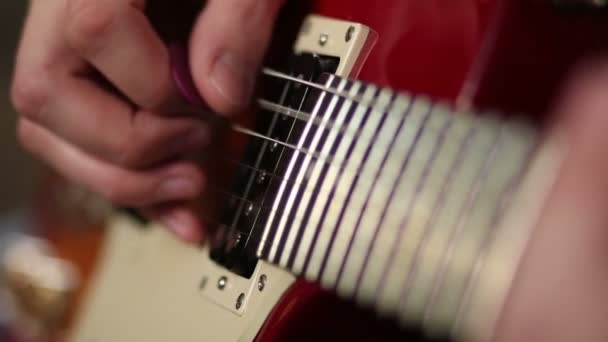 Hands of man playing electric guitar — Stock Video