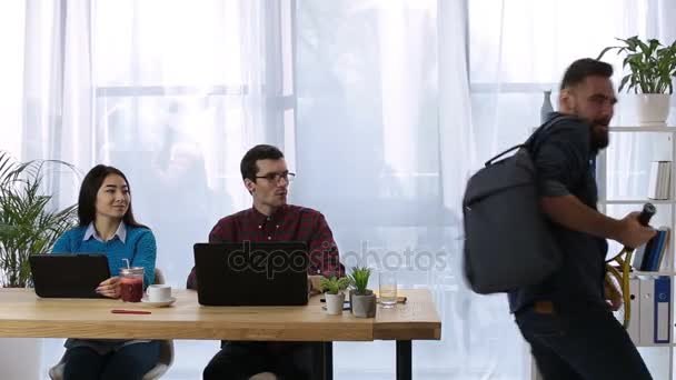 Joyful hipster entrepreneur going to play tennis — Stock Video