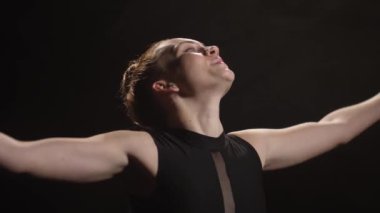 Portrait of actress expressing happiness in dance