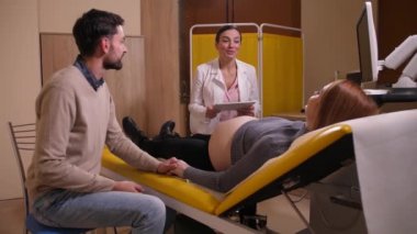 Doctor talking about ultrasound scanresults
