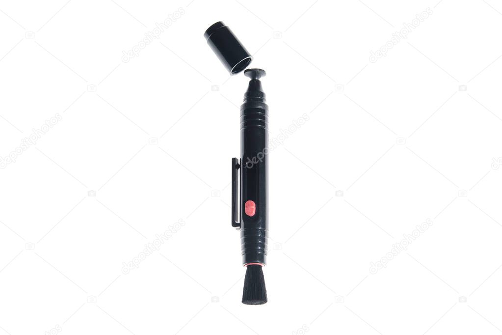 Lens pen and brush for cleaning camera isolated on white background