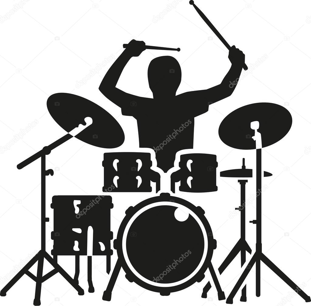 Drum kit with drummer in action