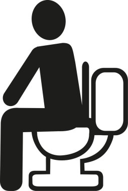 tuvalet üzerinde oturan adam