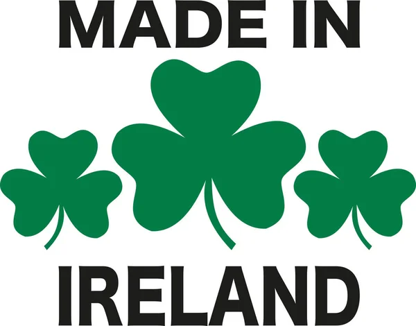 Made in Ireland design with three shamrocks — Stock Vector