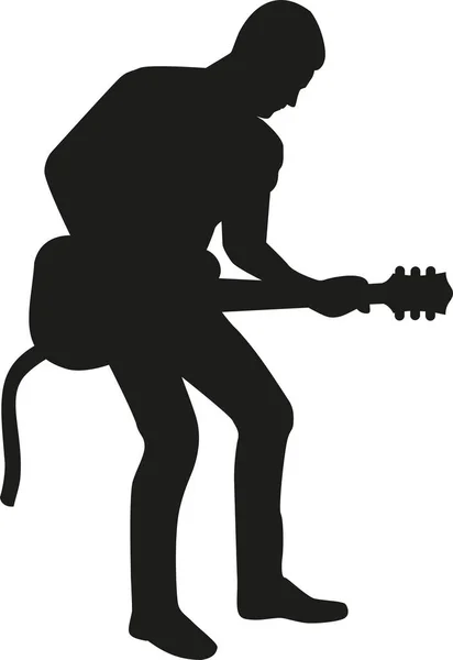 Gitarrist spielt Männersilhouette — Stockvektor