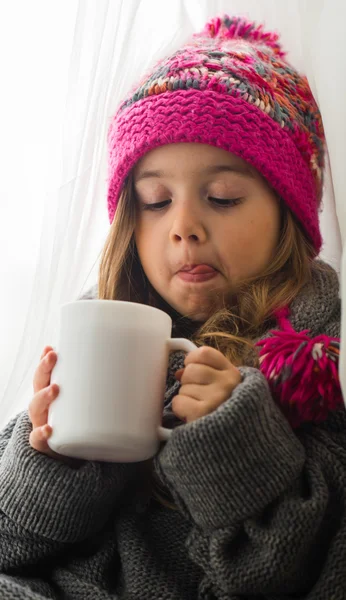 Cute little girl in fashionable winter clothes — Stock Photo, Image