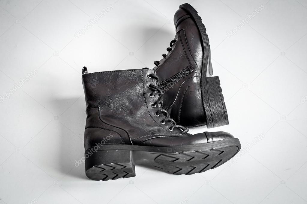 black boots on white background