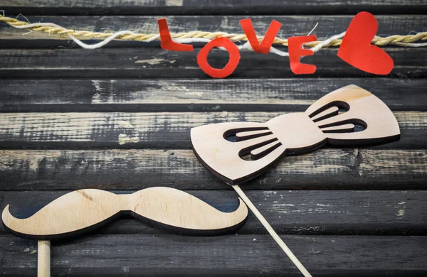 word love made of paper and wood background