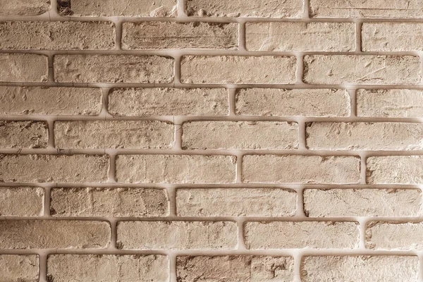 Beige brick wall