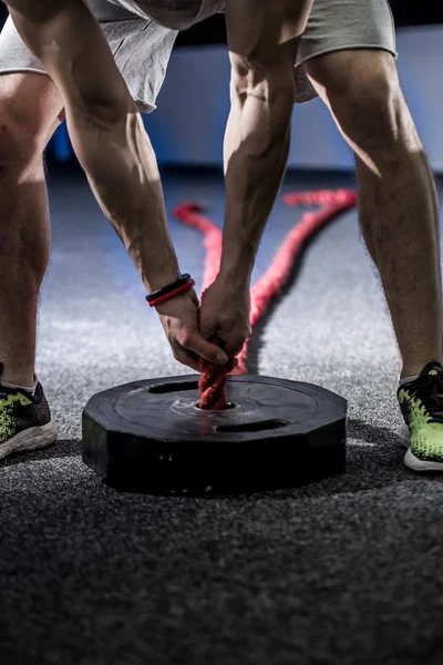 Le sportif relève la barre — Photo