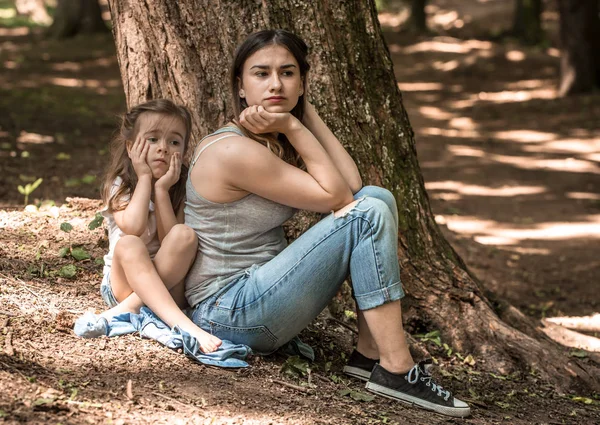 Sad emotions of a girl with her mother — Stock Photo, Image