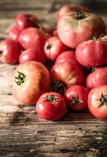 Ripe Tomatoes on wooden background — Stock Photo, Image