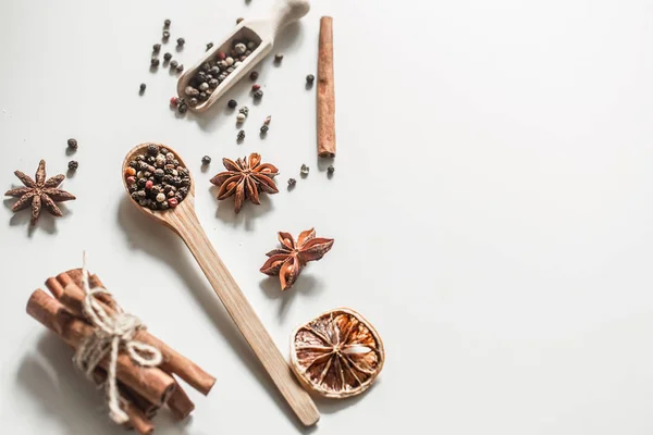 spices in a spoon isolated on white background,