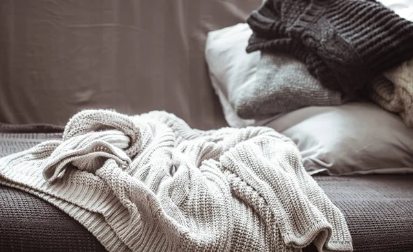 A stack of knitted sweaters — Stock Photo, Image