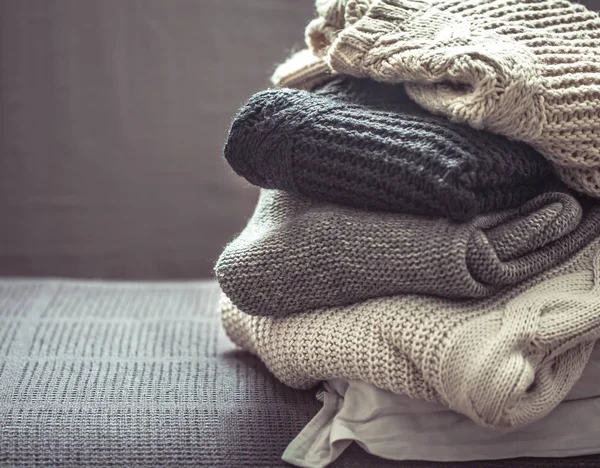 A stack of knitted sweaters — Stock Photo, Image