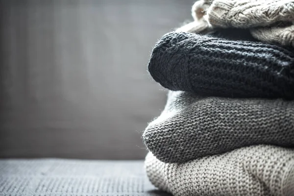 A stack of knitted sweaters — Stock Photo, Image