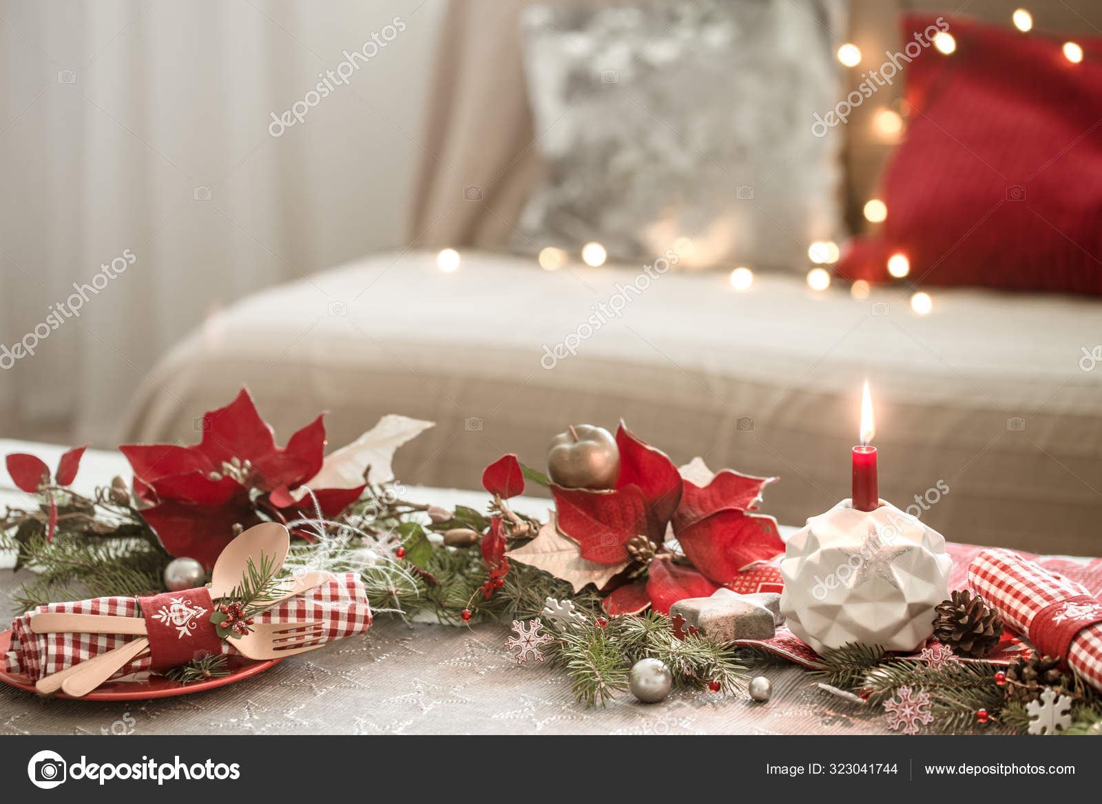 Beautifully decorated Christmas table in the living room. Stock Photo