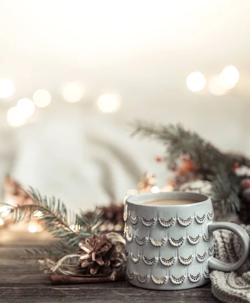 Festive background with Cup on wooden background with lights. — Stock Photo, Image