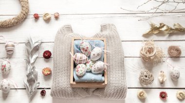 Easter stylish still life on a wooden background.