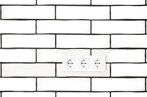 Electrical Outlets White Brick Wall Space Text — Stock Photo, Image
