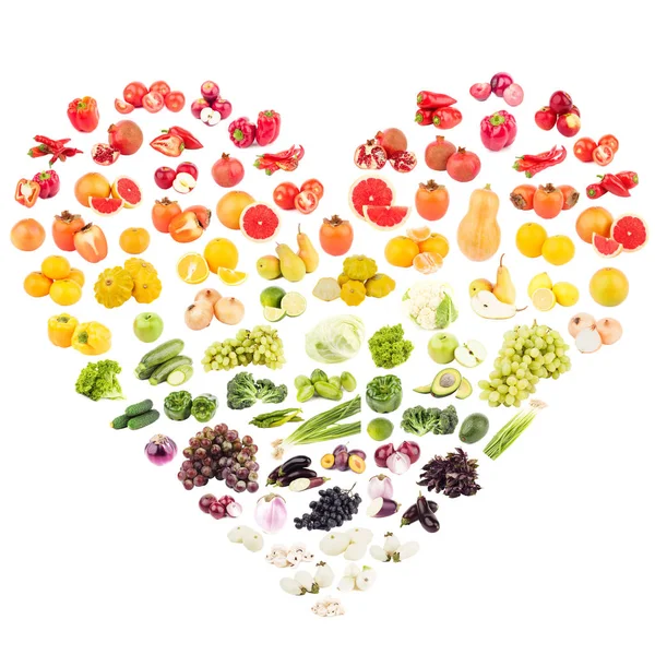 Different fruits and vegetables in the shape of the heart — Stock Photo, Image