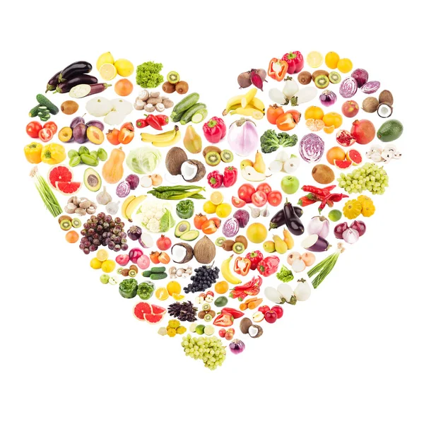 Rainbow made from different fruits and vegetables in the shape of the heart — Stock Photo, Image