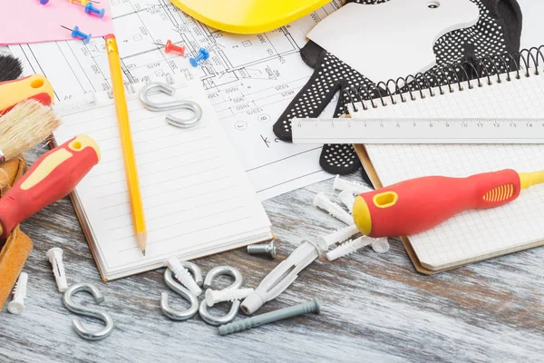 Different construction tools, wooden background — Stock Photo, Image