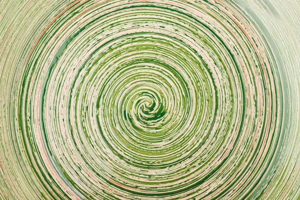 Green gloss background with spiral pattern