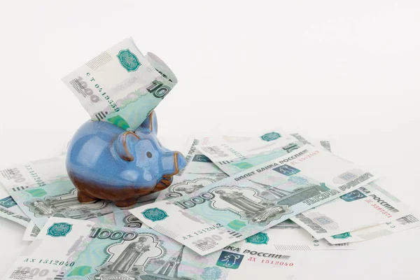 Russian rubles and piggy bank, isolated on white — Stock Photo, Image